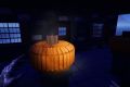 Image from the game Satisfactory featuring a house decorated for visitors trick-or-treating on Halloween, the shot focussing on the pumpkins atop the posts at the steps leading to the porch of the house.