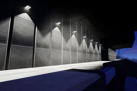 Image from the game Satisfactory featuring a memorial building, shot focussing on the lit wall of the memorial building.