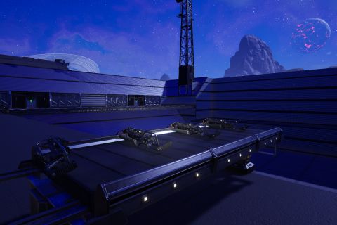 Image from the game Satisfactory featuring a scene depicting a compound from which one can defend against zombie attacks, shot focussing on a table made from the game's conveyor belts holding several of the game's rifles.