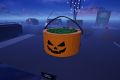 Image from the game Satisfactory featuring a giant orange candy bucket styled after a jack o' lantern, with the game's jelly landing pads being used as a stand-in for candy in the bucket.