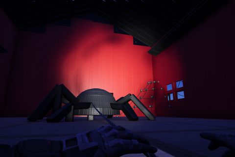 Image from the game Satisfactory featuring a scene depicting a giant spider inside a cobweb-covered red farm building, shot positioned to appear that the viewer is being dragged into the building by the giant spider.